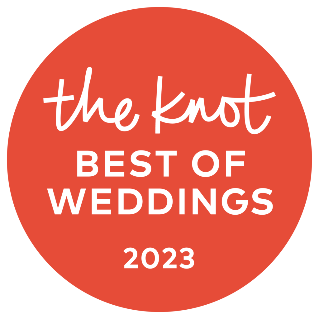 Red circular badge with white text reading "the knot BEST OF WEDDINGS 2023.