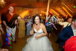 Bride dancing with people at a wedding